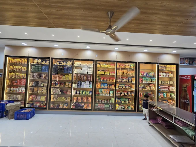 Grand wood-finish display cabinets with warm LED lighting